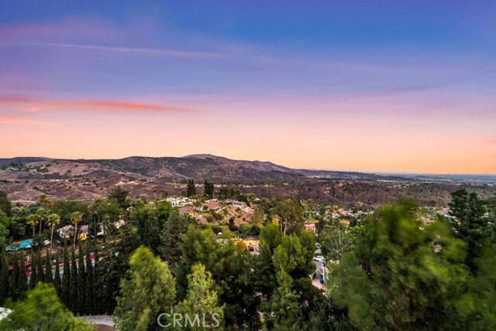 Photo of 10182 Cowan Heights Drive, North Tustin, CA 92705 (MLS # PW25235199)