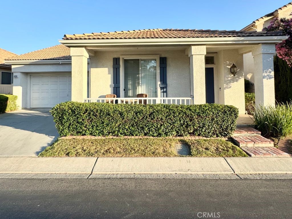Located at Sun Lakes Country Club with NO MELLO ROOS! - Features 1 bedroom, 2 bathrooms, and a den that can be used as an additional bedroom, office, or flex space. The home needs a little cosmetic TLC but the bones are good, the location is solid and the potential is exceptional. Bring your imagination and take this GEM to the next level! Features vaulted ceilings, a country kitchen, two car garage with epoxy flooring, updated in 2021 with New vinyl flooring, New window coverings, New water heater, ALL appliances included and a private yard with covered patio and garden overseeing the tennis courts and mountain views. Close to the clubhouse amenities include golf, fitness center, tennis, indoor pool, beautiful scenic walking trails and so much more!