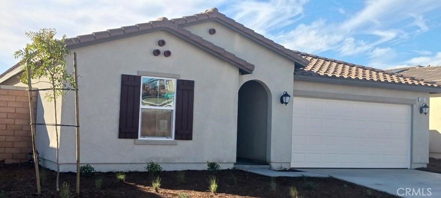 New Spanish style single story home built in November 2023. 3 bedrooms and 2 full bathrooms and 2 attached car garage large with large backyard. Crisp white cabinets with granite kitchen countertops. Spacious great room, large master bedroom, walk-in closet, inside laundry room, tankless water heater, Energy STAR certified homes tested and verified by third party inspection.  Minutes to 215 via HWY 74 walking distance to local elementary and high school, shopping and dining nearby at Menifee Courtside Market Place and Menifee Town Center. SunPower solar 12 panels with 405 watt panel. New Whirlpool stove stainless steel, microwave stainless steel, dishwasher stainless steel included, double sinks in master bathroom, kitchen island.