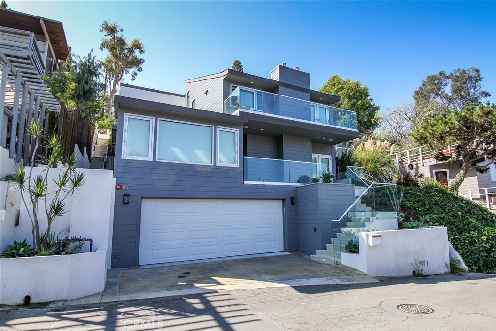 Stunning custom home in the hills of Laguna Beach for rent! Enjoy sunset ocean views from multiple levels and cool ocean breezes from every window. Home is fully furnished except for dish ware and linens. House includes central air and heat, high end appliances, wood flooring and custom tile throughout. Minutes from all the wonderful things Laguna Beach has to offer, including beautiful beaches, the Sawdust Festival and Pageant of the Masters. Come make this your home today!