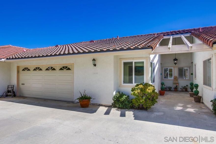 Come and live in the beautiful community of Lake San Marcos. This lovely 2 bed/2 bath home boosts views of the Double Peak mountains. The morning sunshine will lift your spirits and brighten the start of your day over a cup of joe. Kitchen has Corian counter tops, Plantation blinds, custom shades in the living room, cozy gas fireplace in the living room for those crisp winter nights, carpet in bedrooms, D.R. and L. R. porcelain tile at entry, halls and bathrooms, crown molding throughout. Low maintenance backyard. Walking distance to the lake, pickle ball, golf courses and restaurants. A must see, won't last long. Close to all....
