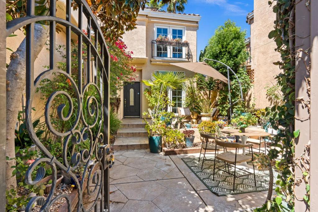 Nested in a gated community with 24-hour security guard on site, this single family home offers unmatched peace of mind. Enjoy your morning coffee in the beautifully landscaped courtyard filled with flowers, or host a BBQ with family and friends in the spacious side yard, both seamlessly connected to the living, kitchen and dining areas to create an open, flowing indoor-outdoor living experience. Open layout. High ceilings. Abundant windows. The entire house is flooded by natural light. Oversized primary suite. A charming loft that can perfectly serve as a children's play area or a home office. Owned solar panels. A lot of improvements. All issues in home and pest inspection reports have been fixed- a $200,000 value! The community offers swimming pool, tennis court, and PRIVATE hiking trail leading to panoramic views of the city, direct access to Canyon Lakes Golf Course, and additional nearby trails where deers, rabbits, and turkeys can often be seen, creating the feeling of living in nature while still being close to every convenience. Top-rated schools. An unparalleled setting that combines beauty, comfort, modern, elegance, nature, and community, this property represents a truly exceptional lifestyle. Seize the chance to get this dream home before the market heats up again!