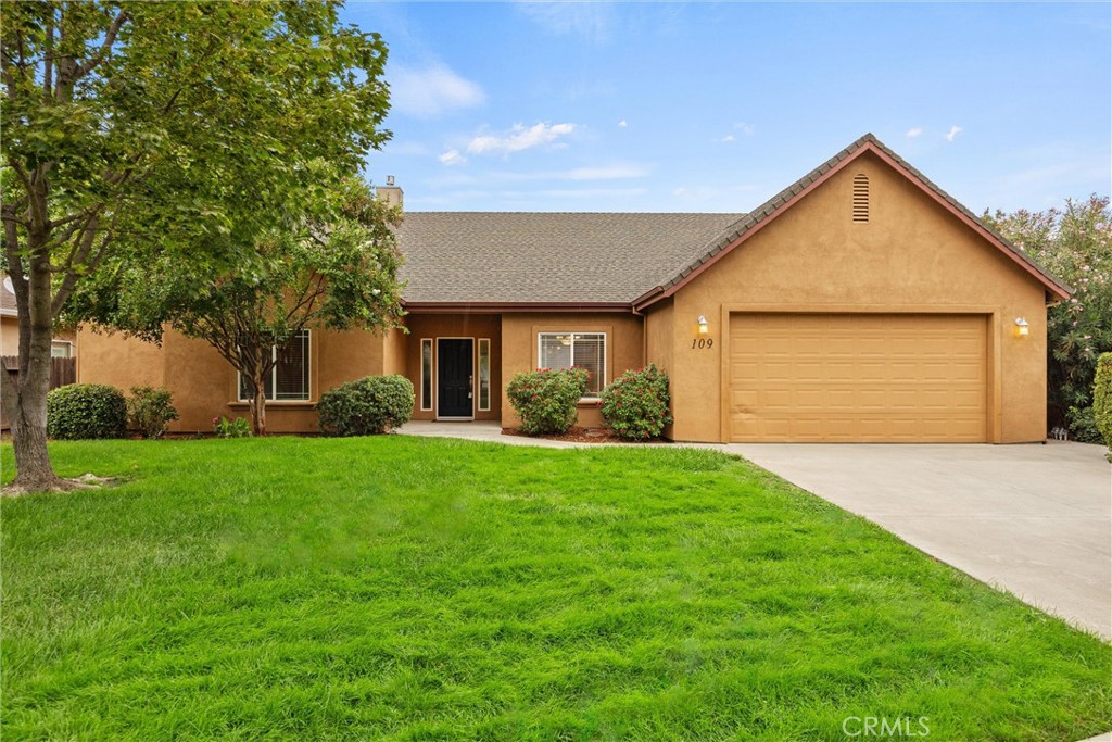Welcome to this stunning Chico home located in the highly sought-after Husa Ranch Subdivision—enjoy community park access with no HOA fees! It's also just blocks from Bidwell Park, and in close proximity to the vibrant Meriam Park. You’ll have a perfect blend of outdoor adventure and urban convenience right at your doorstep. This spacious residence boasts 4 bedrooms and 3 bathrooms across 2,480 square feet of open-concept living space. The home shines with its tall ceilings, recessed lighting, and an abundance of natural light. The modern kitchen is equipped with under-cabinet lighting, a built-in gas range, an oven, a microwave, and plenty of pantry space—ideal for culinary enthusiasts. It features a breakfast bar, cozy breakfast nook, and seamless access to the living room for a comfortable flow. The formal dining area is inviting for entertaining. The four bedrooms provide versatile options, including the potential for a home office with a convenient walk-in closet. The luxurious primary suite, which includes double sinks, a relaxing soaking tub, and a walk-in shower. Plus, discover a dedicated laundry room featuring floor-to-ceiling storage, utility sink, and ample countertop space for your convenience.
Step outside to the backyard, where you'll find a covered concrete patio perfect for summer barbecues and morning coffee, plus a lush green lawn, ready for you to personalize. Don’t miss the opportunity to experience this incredible home for yourself!