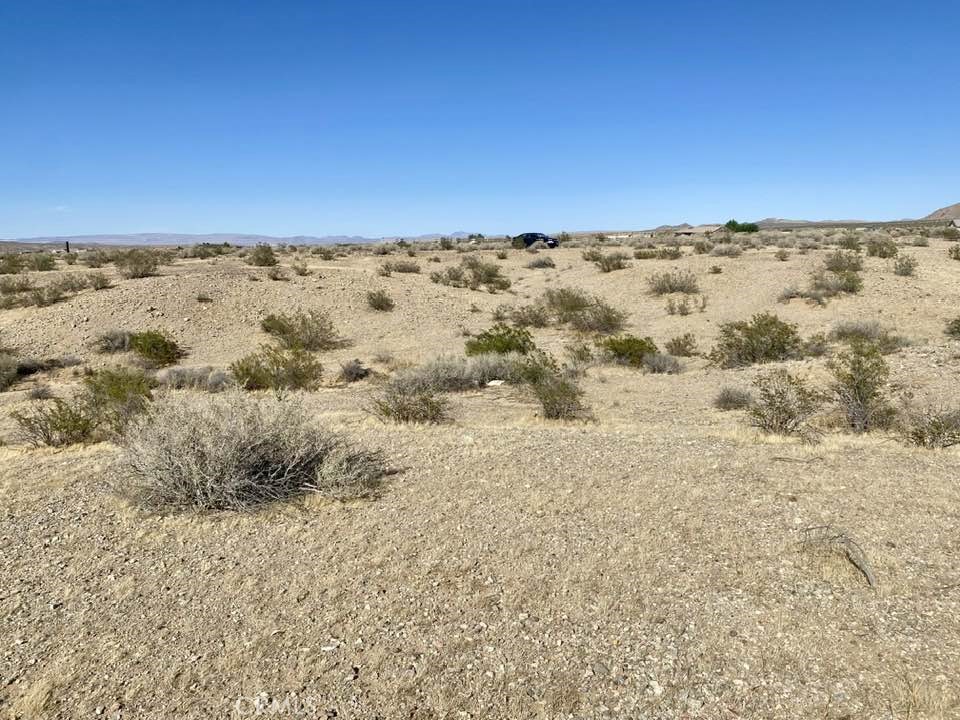 2.2 ACRES in the City of Helendale. Known for its open land, rural lifestyle, and proximity to Silver Lakes. Location situated between Wrangler Rd. and Bullion Rd. in Helendale, CA. Designated as Residential 1 (R1), indicating suitability for single-family residential development. Go Direct.