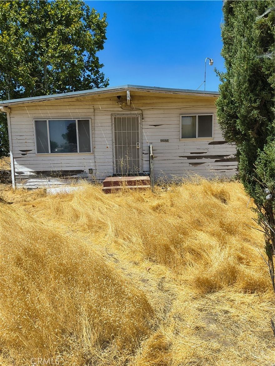 Welcome to your next investment opportunity! Nestled on a generous 4.5 acre lot, this 3 bedroom, 1 bath home awaits your vision and creativity. While the property is in need of significant repairs, it offers immense potential for renovation or redevelopment . Enjoy the freedom of 4.5 acres, perfect for gardening, outdoor activities, or future expansion. Turn this diamond in the rough into your dream home with the right renovations. Located in a quiet and peaceful area, this property is just minutes away from local amenities and outdoor activities. Whether you're looking for a new project, a place to call home, or an investment opportunity, this property has the potential to deliver. Don't miss your chance to transform this hidden gem!