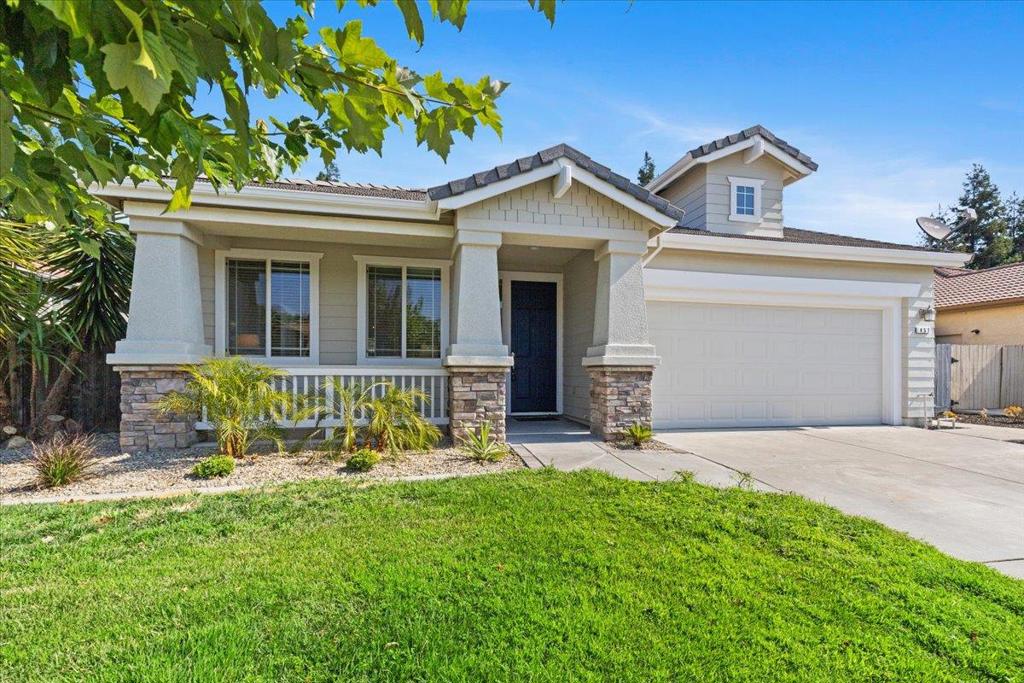 Located in the desirable Pomelo Grove neighborhood, this spacious 3BD/2BA single-story home offers 2,070 sq. ft. of living space on a 7,400+ sq. ft. lot. A former model home, it features an open floor plan filled with natural light. The inviting front porch leads into a bright living room. The kitchen includes a built-in oven, gas cooktop, center island, and opens to a separate dining areaideal for family meals. The large primary suite offers a walk-in closet and a luxurious bath with soaking tub, shower stall, and double vanity. Two additional bedrooms and a full hallway bath are generously sized. The indoor laundry room features a utility sink for added convenience. Enjoy the landscaped backyard with fruit trees, perfect for entertaining or relaxing. Recent updates include new interior paint, new carpet, refreshed landscaping, and a new split-zone AC system (2021). Additional features include dual-pane windows, a tankless water heater with individual sink/faucet control valves, and finished garage walls. Built in 2007, this home is close to parks, shopping, dining, and offers easy freeway access. A wonderful opportunity to own in a prime location!