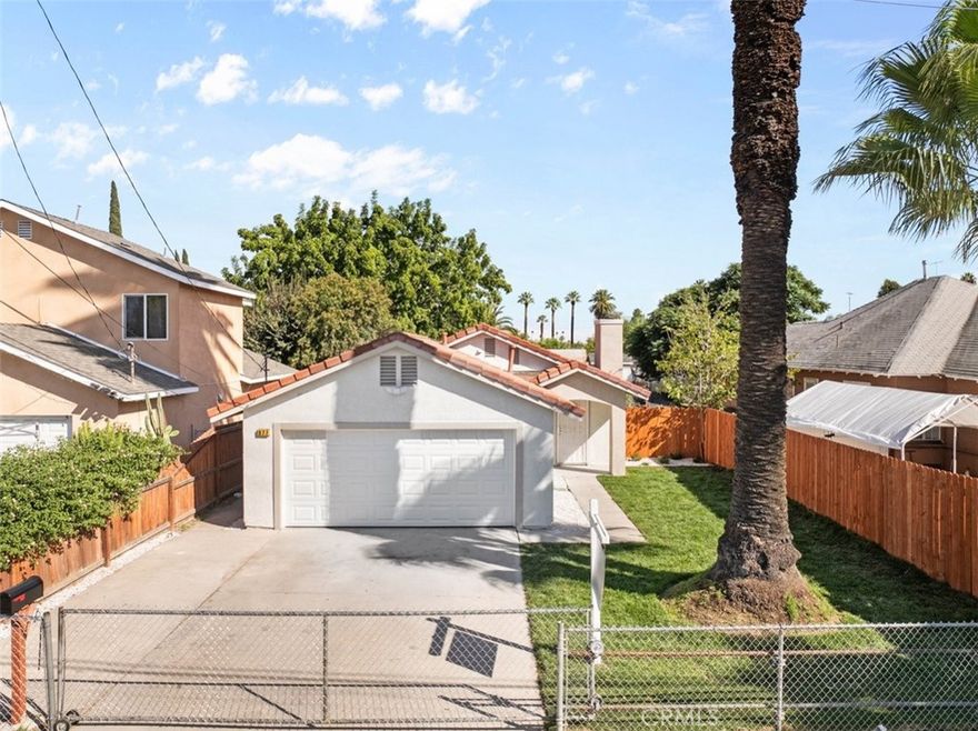 Beautiful Turnkey 3 Bedroom 2 Bath House with Attached 2 Car Garage in San Bernardino. With Direct garage access. Exterior and Interior Have Been Completely Remodeled. Exterior Features New Windows, New Paint, New Garage Door, and Freshly Landscaped Front Yard. Interior features New Paint, New Baseboards, New Panel Doors, New Light Fixtures, Recessed Lighting, Ceiling Fans, and SPC Wood Look Vinyl Flooring Throughout. There are 3 Good Sized Bedrooms with Good Closet Space. There is a Master Bedroom with it's own Full Bathroom and a Walk-In Closet. Bathrooms have been Remodeled with New Tiled Shower / Tub, Toilet, Sink, Fixtures, and Vanity with Quartz Counter Top. Living Room Features Plenty of Space for All your Furniture. Kitchen is Remodeled with New Cabinets, New Quartz Counter Tops, New Sink, New Range Hood, New Fixtures, Free Standing Stove Oven, Garbage Disposal, and New Dishwasher. House features Central Heat and A/C. House has a Back Yard. Not too far from Baseline and the 215 Freeway. There is Shopping, Schools and Dining Nearby. Call Today to Take a Look At this Great Property!