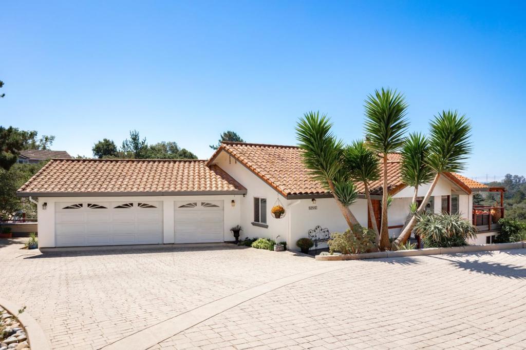 Welcome to 18530 Berta Ridge Place, Prunedale, CA 93907, a stunning retreat nestled in the tranquil hills of Monterey County! This beautifully maintained home offers the perfect blend of privacy, comfort, and scenic beauty. Set on a spacious lot, you'll enjoy panoramic views of rolling hills and Monterey Bay, creating a serene backdrop for everyday living. Step inside to discover an inviting open-concept layout with abundant natural light, vaulted ceilings, and elegant finishes throughout. The gourmet kitchen features modern appliances, ample cabinetry, and a breakfast bar ideal for entertaining or family gatherings. The primary suite is a true sanctuary, complete with a spa-inspired bathroom with a rain shower and generous closet space. Outdoor living is a dream at this property, featuring two spacious decks, a lush backyard perfect for gardening, and plenty of room for pets. Enjoy the tranquility of country living but just minutes from Highway 101, making commutes to Salinas, Monterey, Santa Cruz, and San Jose convenient. You'll also be close to shopping, Starbucks, and the Elkhorn Slough National Estuarine Research Reserve. Don't miss your chance to own this exceptional property in one of Prunedale's most desirable gated neighborhoods. Schedule your private tour today!