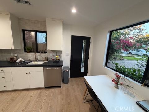 Photo of 425 Terraine Ave #A, Long Beach, CA 90814 (MLS # PW26008071)