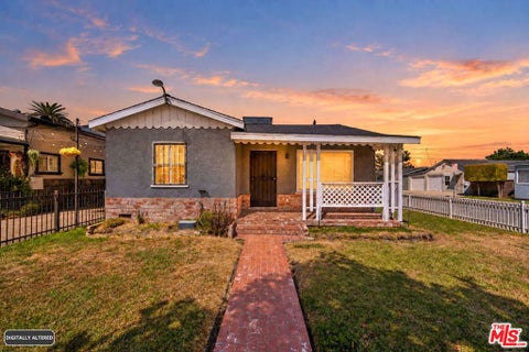 Photo of 601 W Arbutus Street, Compton, CA 90220 (MLS # 26992809)