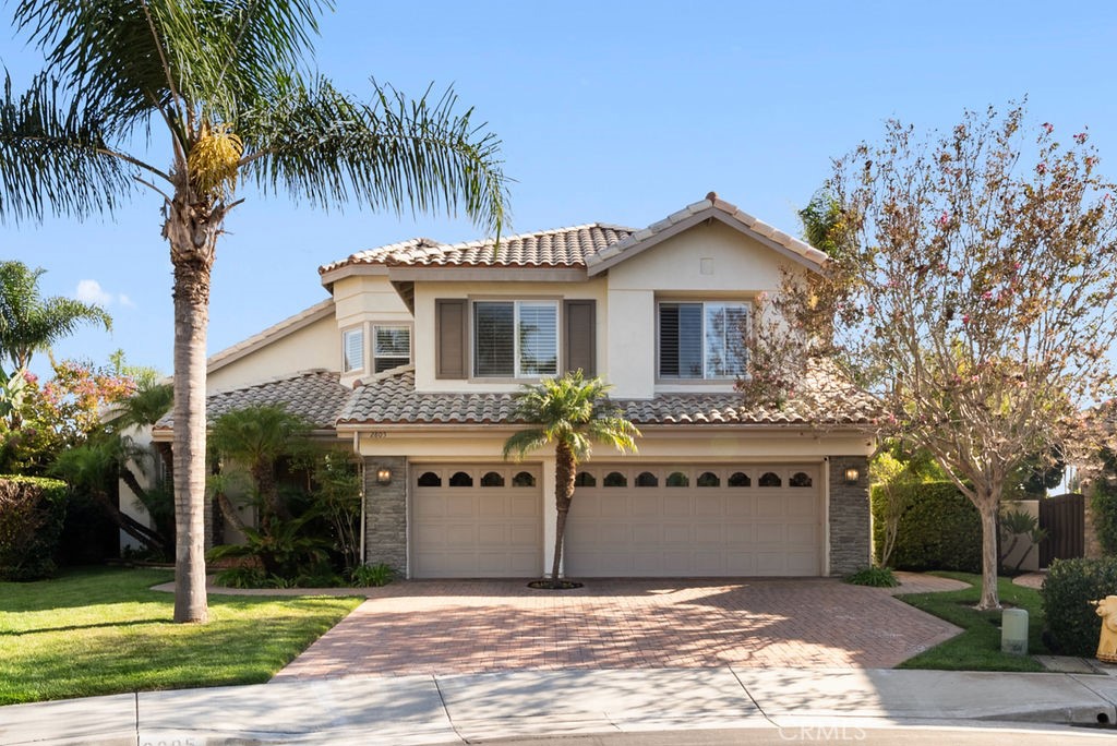 Tucked into a quiet cul-de-sac in the desirable El Encanto neighborhood, 2805 Orense is a beautifully maintained five bedroom, three bathroom home that delivers space, comfort, and timeless California charm. Set on an expansive 13,000+ square foot lot, this two-story residence offers over 3,300 square feet of living space designed for everyday ease and effortless entertaining. Inside, you're welcomed by soaring ceilings, abundant natural light, and a thoughtful floor plan that balances formal and casual living. The spacious kitchen features custom cabinetry, a large island, walk-in pantry, and easy flow into the family room, where a cozy fireplace creates the perfect setting for movie nights or quiet evenings at home. The main level includes a full bedroom and bath, ideal for guests or a home office, while upstairs, the primary suite offers a peaceful retreat with its own fireplace, oversized walk-in closet, and spa inspired bath with soaking tub and dual vanities. Three additional bedrooms round out the upper level, each generously sized and filled with natural light. Step outside and you’ll find your own private escape: a resort style backyard with a sparkling pebble finish pool, spa, lush landscaping, and multiple areas to lounge, dine, and enjoy the coastal breeze. With a three car garage, low HOA dues, and no Mello-Roos, all just minutes from award-winning schools, hiking trails, shopping, dining, and San Clemente’s world famous beaches. 2805 Orense offers the space you need, the lifestyle you want, and the location that ties it all together.