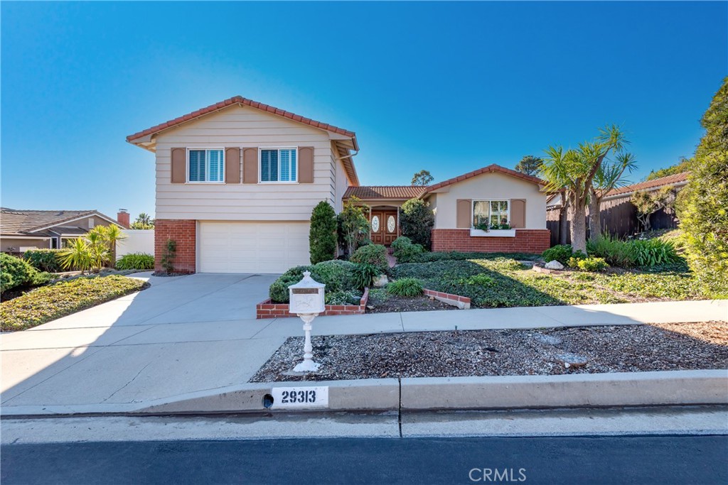 This nicely upgraded and beautifully maintained, light and bright 4 bedrooms, 2.5 bath, over 2500 square feet home on an over 9000 square feet lot is located in one of the loveliest neighborhoods of Palos Verdes. Formal entry. Living and dining combination with ample windows, a fireplace and sliding glass door opens up to gorgeously landscaped back yard with fruit trees and Catalina views. Spacious kitchen with breakfast bar and area. Family room with beautiful newer flooring, fireplace and sliding glass door opens up to the inviting patio and back yard. An upgraded half bathroom and the direct access to the two car garage completes this level. Upstairs features 4 bedrooms and two bathrooms. Master bedroom with Catalina views and own upgraded bathroom. Three additional bedrooms with an upgraded bath completes the upper level. Two of the three bedrooms offer Catalina views. An absolute must see.