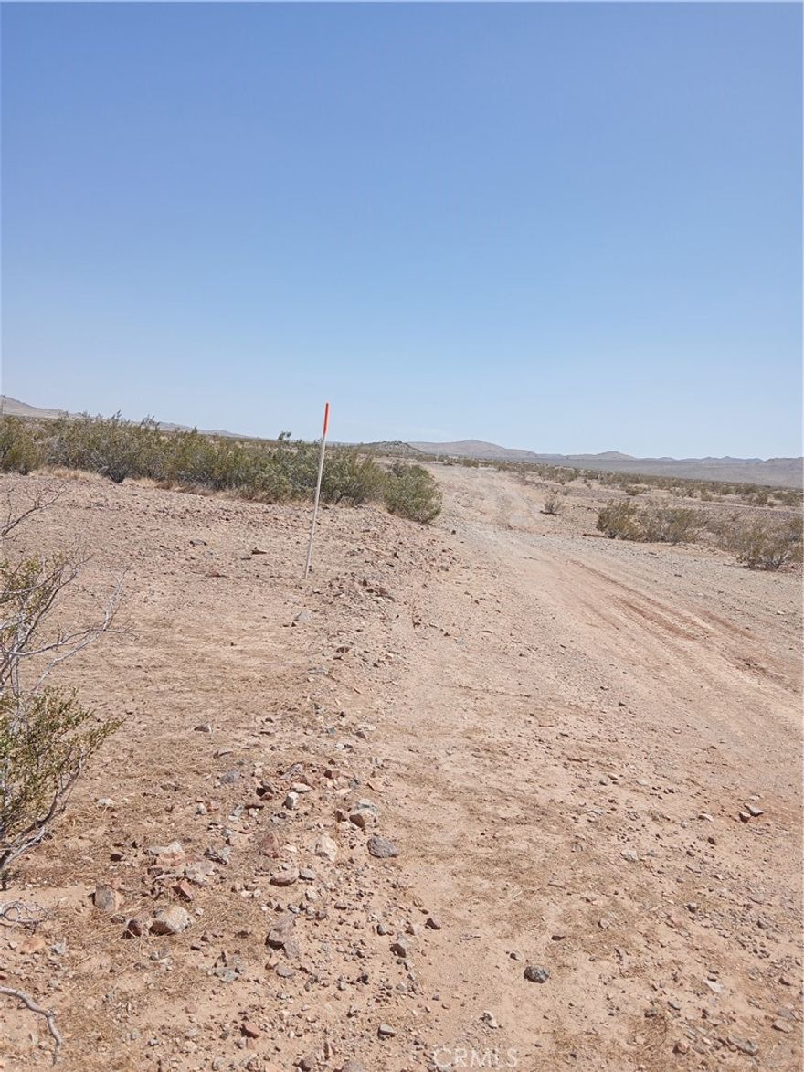 This 2.01 acre parcel is located in Helendale between Victorville and Barstow in San Bernardino County. 19 miles from Victorville, 42 miles from Barstow and 4.6 miles from Helendale. The property is close to Silver Lakes, a HOA Community with over 3000+ homes. A 27 Hole Golf Course, 2 Lakes and so much more. The property has potential for just the right buyer. You can make it your RV and camping getaway spot, bring the off road toys or star gaze in the peace and quiet for miles. Zoning is RC (Resource Conservation) This zoning district allows for open space, single homes on large properties and 

comparable uses. Buyers to contact the County of San Bernardino Planning Dept.to verify uses and permits for your future plans on this property. Use the APN# for your inquiries. Some residents have put in their own well for water, propane tanks for gas and electricity. Solar Panels have been used also.