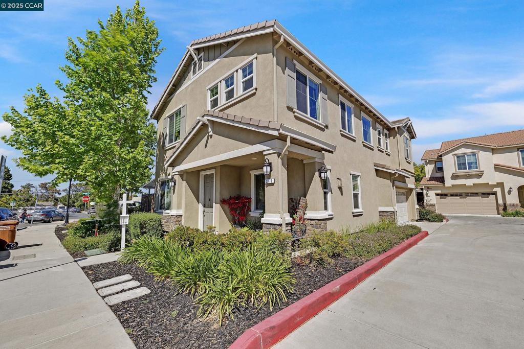 Huge Price Reduction!!! AS-IS Sale Welcome to 210 Belle Harbor Circle, located in the welcoming community of Pittsburg, CA! This charming corner-lot home is perfect for a growing or extended family—the dream home you've been searching for! With 5 bedrooms, a loft, and 4 bathrooms, including a bedroom and full bath downstairs, this home offers 2,484 sq ft of spacious living. Step into a bright, airy floor plan with engineered wood flooring, tile in the kitchen, and carpet upstairs—ideal for comfort and functionality. Enjoy the cozy fireplace, perfect for cooler nights, and an open-concept kitchen that serves as the heart of the home—a space where everyone can gather and connect. Each bedroom offers a peaceful retreat, while the master suite includes its own ensuite bath, creating a private haven for rest and rejuvenation. Features include a low HOA fee, EV Tesla charger, and leased solar system from Sunrun. Conveniently located near schools, shopping, restaurants, Costco, the Marina, and the new BART access at Hwy 4/Railroad Ave. Easy Hwy 4 access. AS-IS Sale