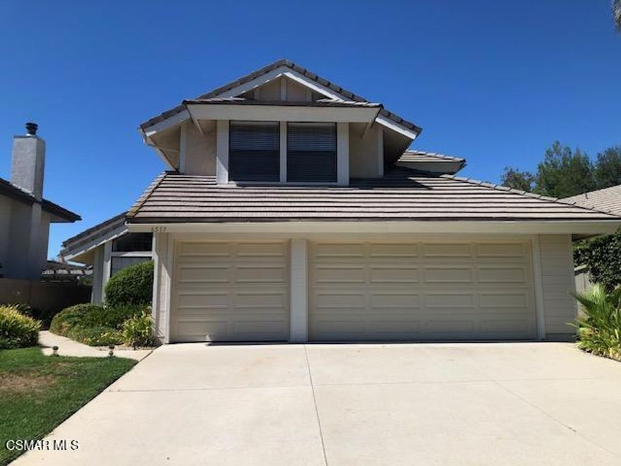 Beautiful, upgraded two story home in Oak Park, Vaulted ceilings, one bedroom downstairs,one full bathroom downstairs, Wood-like flooring, attached garage.  Gardener and HOApaid by Owner.