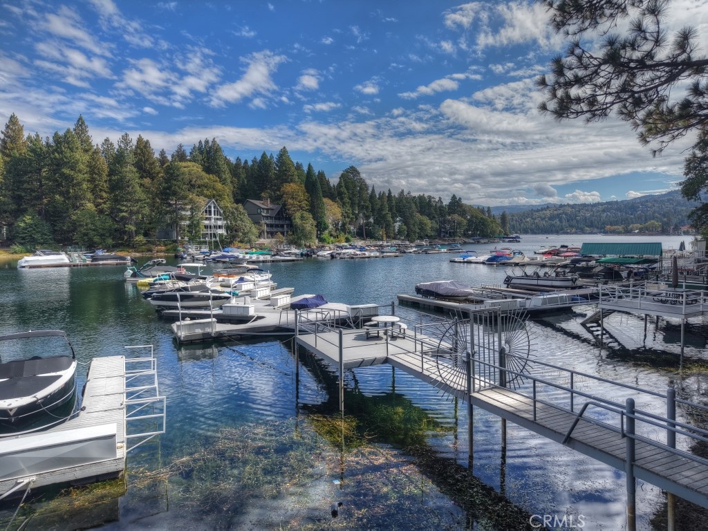Fantastic and Fun Opportunity to Pair with Your Lake Arrowhead Home!
The lure of Meadow Bay is real — calm waters, ample parking, restrooms, and that unmistakable mountain magic. Friends are forever here, in a community within a community.
This multiple boat slip will multiply your heart feels as you soak in the towering pines, the charming lighthouse, and the unmistakable Arrowhead vibe. The approach is wide and easy — perfect for larger floats and stress-free docking.
Hop in your boat, cruise the bay, explore the lake, or head to the Village for an afternoon (or evening!) of lakeside fun.
Let’s go — the lake is calling