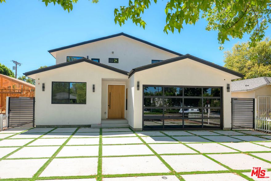 Sherman Oaks Luxury Living Modern Elegance with Pool & Space to Entertain. Welcome to this brand-new contemporary residence nestled in one of the most desirable neighborhoods of Sherman Oaks. Perfectly blending modern elegance, comfort, and functionality, this home is designed for today's lifestyle and ideal for those seeking a high-end, move-in-ready property. Property Highlights 4 Bedrooms + 1 Office space are conveniently located downstairs, while three spacious bedrooms upstairs offer privacy and comfort ideal for families or hosting guests. Expansive Open Floor Plan Enjoy seamless flow between the living room, dining area, and chef's kitchen filled with natural light and designed for both everyday living and elevated entertaining. Chef's Kitchen Outfitted with top-of-the-line appliances, sleek cabinetry, and a large island perfect for gatherings or quiet morning coffee. Indoor-Outdoor Living Large sliding doors open to a private backyard oasis featuring a sparkling pool, lounge areas, and plenty of space to entertain or unwind.