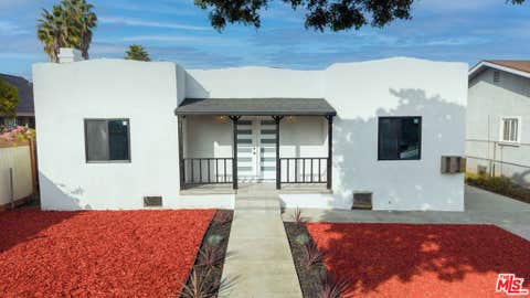 Photo of 1341 W 94th Street, Los Angeles, CA 90044 (MLS # 26872515)