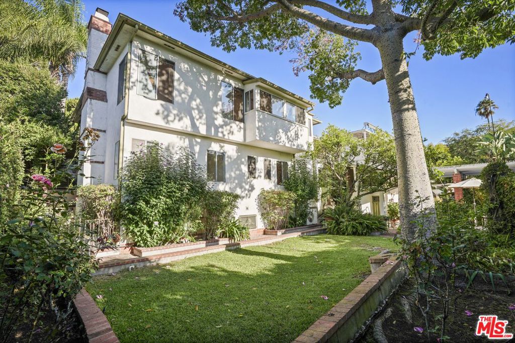 Formerly owned by Disney animation legend Marc Davis, one of Disney's famed "Nine Old Men" and core animator (Snow White, Bambi, Cinderella, Alice, Br'er Rabbit, Cruella de Vil), presented here is a rare and valued opportunity to place your own design mark on this gated, 1930's California bungalow. A sublime urban hills retreat located in one of the most sought after neighborhoods in prime Silver Lake. A property residing harmoniously with its organic canyon environment of towering trees and verdant greenery. Inside, the flexible floorplan provides gracious transition from room to room, designed for easy relaxed living and entertaining. Abundant windows suffuse the space in natural light and showcase stunning vistas of the surrounding canyon. Wood floors grace the living areas. The dining room lends itself ideally to both friend and family gatherings of all occasions. Private, peaceful and serene, the backyard and expansive brick patio embody the coveted Southern California lifestyle of endless al fresco leisure and relaxed outdoor entertaining. Highlights include lower level bonus rooms and bath plus an apartment with its own separate entrance offering a myriad of possibilities! Ideally located in the highly acclaimed Ivanhoe Elementary School District and just moments to chic shopping and dining that makes Silver Lake the place where you want to live. Welcome! NOTE: Main house: 1,827 sq.ft. Lower level: 338 sq.ft. Attached apartment: 502 sq.ft.