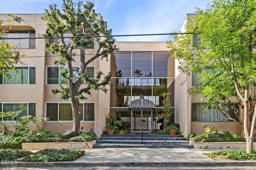 Welcome home to sophisticated condominium living in the highly sought-after Chandler Estates area of Sherman Oaks. This beautiful residence offers the perfect blend of style, comfort, and convenience in one of the Valley's most desirable locations.Grand double entry doors lead you in to a wonderfully open floor plan where living, dining, and wet bar areas flow seamlessly together - ideal for both everyday living and gracious entertaining. Natural light pours in through a picture window in the dining area, while the covered patio, accessible from the living room, extends your living space outdoors, perfect for enjoying California's indoor-outdoor lifestyle.Fresh paint and brand-new flooring throughout provide immediate move-in appeal. The exceptionally spacious primary suite is a true retreat, featuring abundant closet space, a dedicated vanity area with lighting, and a full bathroom with a freshly reglazed tub. The generously-sized second bedroom offers excellent storage/closet space, attractive built-in bookshelves perfect for a home office or library, and its own sliding glass door access to the covered patio. The well-designed galley kitchen features a breakfast bar and connects to the wet bar area, there is also a convenient second exterior entry - ideal for unloading groceries with ease. Both kitchen and bathrooms showcase fresh paint and new flooring, presenting an excellent opportunity to customize these spaces to your personal taste. The desirable Chandler Estates community offers resort-style amenities including a sparkling pool and impeccably maintained grounds. Ideally situated in Sherman Oaks, just moments from the vibrant dining and shopping scene along Ventura Boulevard, with easy access to both the 101 and 405 freeways. Enjoy proximity to schools, Van Nuys Golf Course, and all the conveniences this premier Valley neighborhood has to offer.
