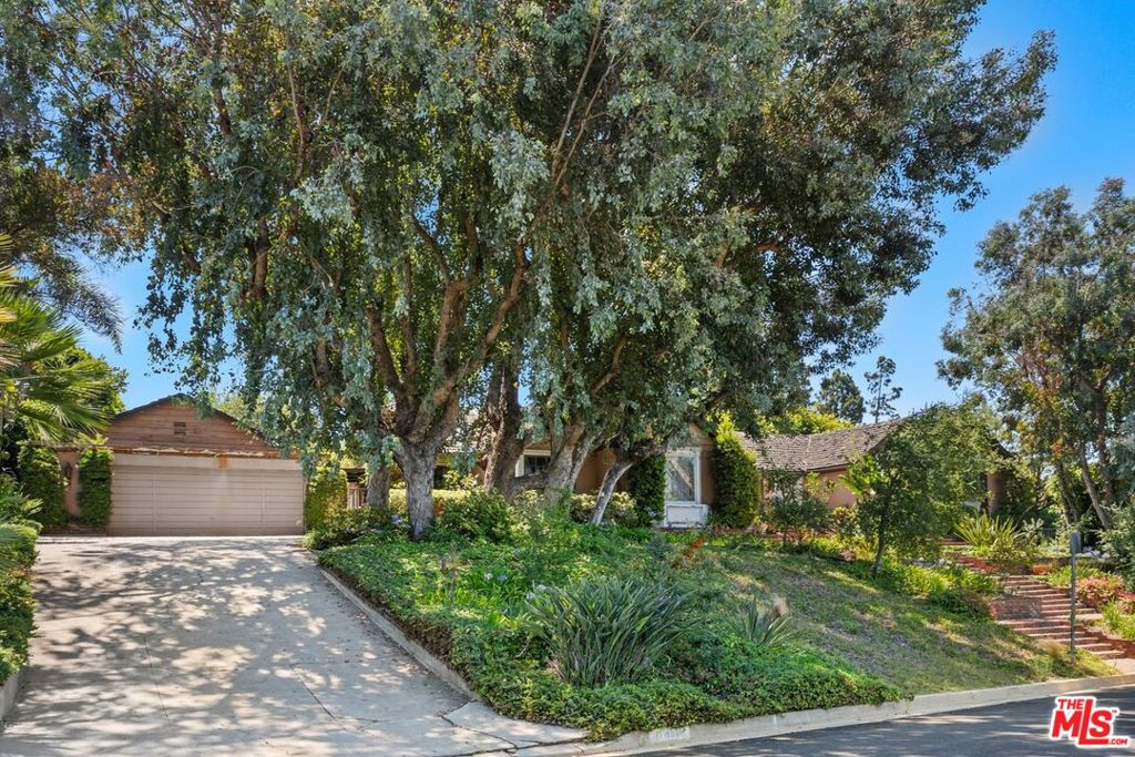 Great Brentwood fixer located south of Sunset amidst large estate homes, on over 19,000sf corner lot. A true gem for those with vision for renovation or new build. The secluded lot with magnificent foliage and mature trees provides endless opportunities. This one-story home with 4 bedrooms, 4.5 baths, large family room with French doors that open to a large patio, garden and pool has been a wonderful home for the same family for over 40 years. Both living room and dining room are oversized and great for entertaining. Large windows and French doors provide abundant natural light. The expansive private pool and deck area is a welcome respite for warm summer days. While the home requires significant updating, its classic design and floor plan provides the perfect opportunity for a transformative renovation. For developers, the lot itself presents an exceptional opportunity to build a grand two-story residence in a neighborhood known for its architectural elegance and enduring value. Whether you're a homeowner seeking to restore a beloved classic or a builder ready to create something new, this property offers lasting rewards. In a market where location is everything, this Brentwood treasure stands out, not just for what it is, but for what it can become. Nearby restaurants, elegant shopping, freeway close and easy access to all the Westside has to offer.