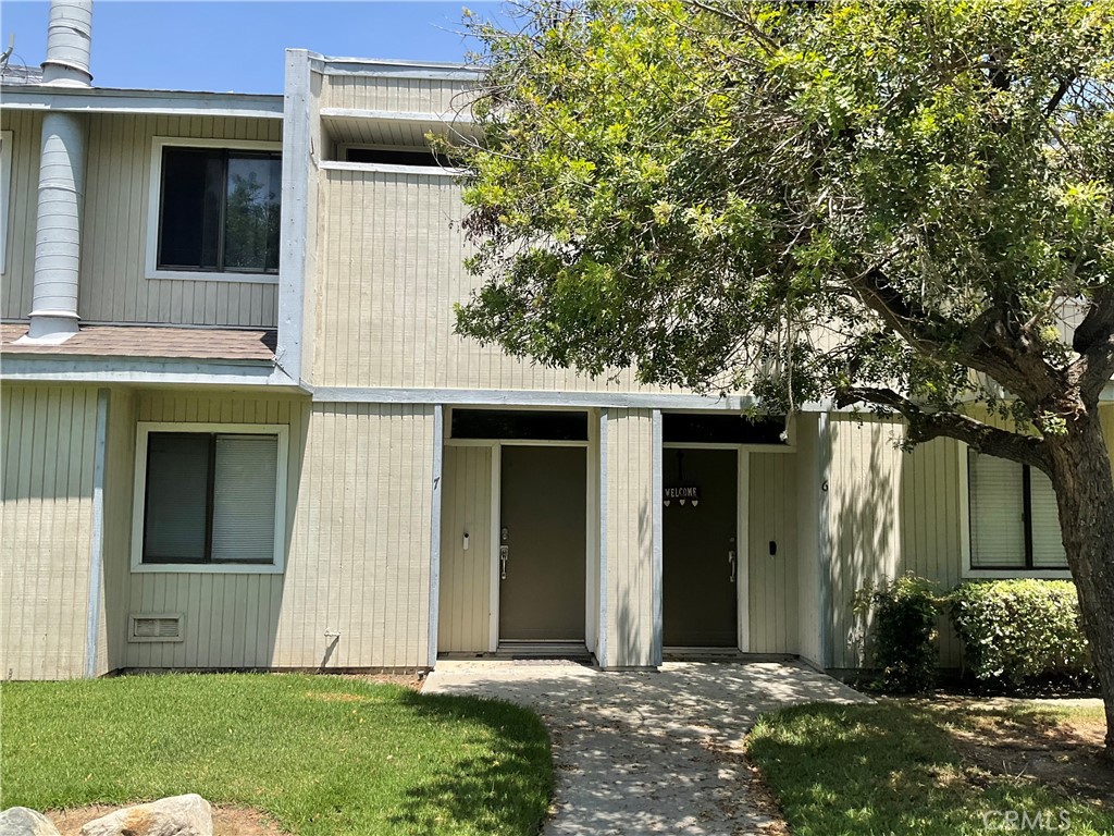 REDUCED FOR QUICK SALE! If you are looking for peace, tranquility and a sense of security, look no further! This Loma Linda condo offers all that and is full of charm with the right atmosphere for one to relax and enjoy nature. This is a three bed; two bath unit located in a gated community and boasts many upgrades. You will enjoy the kitchen with its upgraded counters, appliances and ample storage space. Two nicely done bathrooms, new washer & dryer, and beautiful flooring. Located withing close proximity to the 10 Freeway, you will have easy access to the 210 and 215 Freeways. Close to shopping and other amenities but quiet and cozy enough to give that down home feeling. The complex offers a lot of natural beauty with mature trees and well-manicured lawns. There is a two-car garage with direct access to the unit for convenience with a private back yard space where you can enjoy a quiet relaxing experience