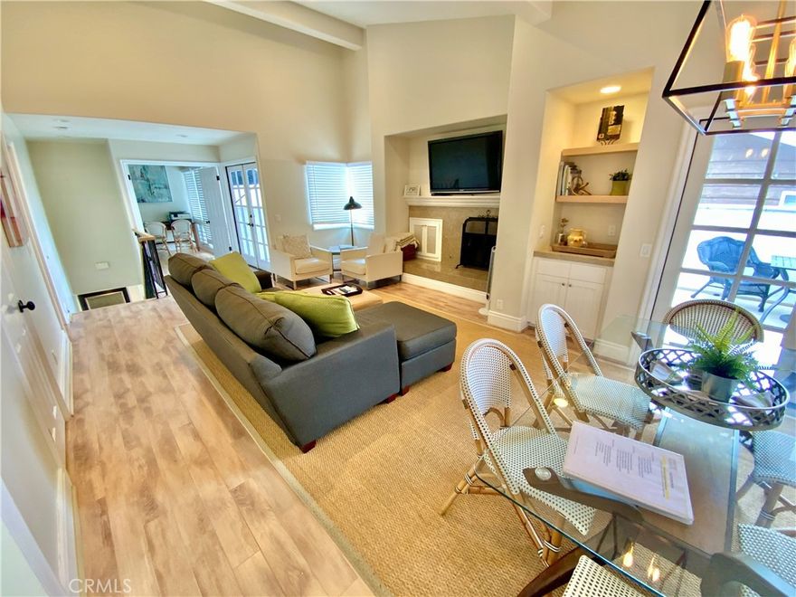 A spacious 1,850 sf condo rarely becomes available in the Village. This large 3 bedroom, 2.5 bath home is walking distance to the beach, shopping, restaurants & parks. Desired extra-wide lot affords formal separate entry & garden. The Primary bedroom suites’ luxury bath has his/her sinks, walk-in closet, and spa shower. Upstairs living and dining room areas are surrounded by an expansive private deck accessed by two sets of French doors, a wood/gas fireplace, dry bar and large kitchen w/skylight & walk-in pantry. The first level has 2 bedrooms, full bath, inside laundry, direct garage access and plenty of privacy...creating perfect options for home office, media, or guest rooms. Offered completely furnished, it includes new stainless gas range/stove, dishwasher, wine chiller, washer/dryer, refrigerator, gardener, dishes and linens. Updated recently and fully air-conditioned, this is truly a home that offers convenience and lifestyle without all the traffic.