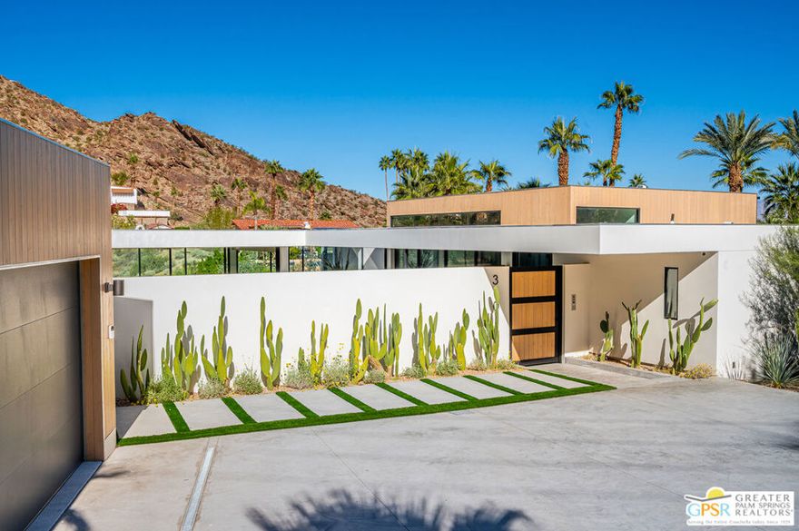 Welcome to this new construction home situated in the hills of the illustrious highly sought after Palm Springs neighborhood....The Mesa !    From the spectacular contemporary curb appeal to its amazing interior design and finishes, one cannot help but want a key to own this special home.    Walls of disappearing glass throughout make this  the ideal Palm Springs home where interior and exterior meet for added amazing outdoor entertainment space.   The massive great room features high volume ceilings  and custom designed fireplace overlooking the outdoor living space, pool & spa and custom outdoor fire feature.   The gourmet kitchen features an oversized island with Fischer & Paykel appliances.  Views of the city lights and the spectacular San Jacinto mountains make this truly a one of a kind hillside home.  The sleek pool and spa are surrounded by generous deck area for entertaining and those sunworshippers.   Custom BBQ area for those special outdoor dining events.    Home features a 6.48 KW solar system.    Two car garage with additional off street parking on oversized driveway.   This is a MUST SEE ONE OF A KIND CUSTOM BUILT HOME.    Architecture by Hawkinsmarkshall.com .  The lot next door at 322 W. Crestview is also available for purchase should a buyer wish to expand the footprint of the lot size for 310 W. Crestview.