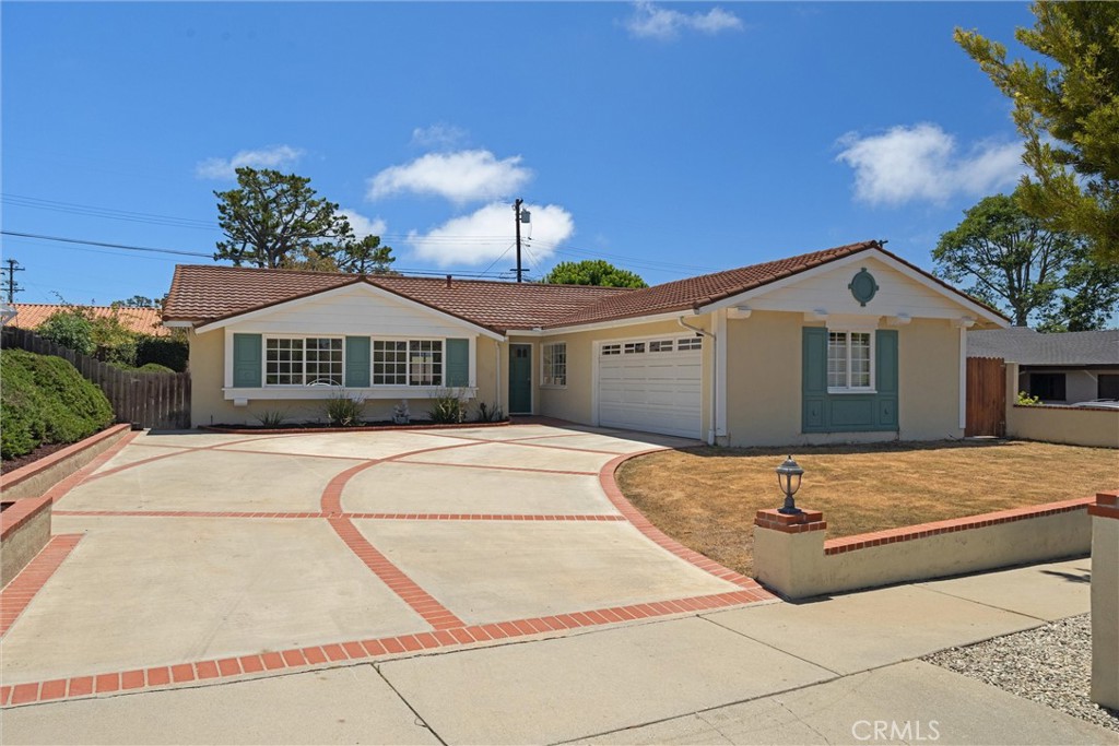 This beautifully maintained family home in the desirable Los Verdes neighborhood offers comfort, style, and functionality in one of the most sought-after communities in the South Bay and Palos Verdes. Step inside to discover a spacious open-concept kitchen featuring elegant granite countertops and a full suite of included appliances—perfect for both everyday meals and entertaining guests. The adjoining family room is warm and inviting, highlighted by recessed lighting and a charming brick fireplace that adds a cozy touch. Enjoy the convenience of an interior laundry area and direct access to the home from the 2 car attached garage. The primary bedroom features its own en-suite bathroom, creating a private retreat within the home. Outside, the long driveway provides ample parking, while the expansive backyard is ideal for family fun and outdoor living. Dine al fresco or entertain guests on the patio, surrounded by mature landscaping and plenty of space to relax and play. Don’t miss this opportunity to own an attractively priced home in the heart of Rancho Palos Verdes, close to top-rated schools, parks, shopping, and more.