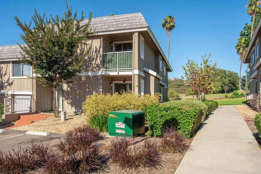 This Condo has lots of potential and the chance for you to do your own enhancements/upgrades.   1 bedroom/1 bath Condo in Hidden Meadows, Lower Outside Corner Unit (only one shared wall), overlooks the Boulder Oaks Golf Course with open space views.   Tile flooring in Living Room/Kitchen/Bathroom and Wood flooring in the Bedroom.  Two closets for ample storage, Patio space and Community laundry on site.  There is 1 assigned parking space.  Use of Hidden Meadows Community Pool and Tennis Courts for $396/year optional. Only 5 min to the 15 Fwy, close to shopping and CSUSM.
