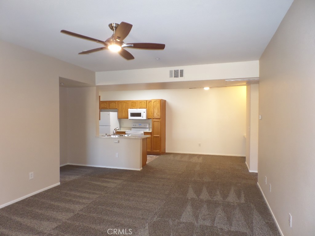 Nice condo in the Madison Park reserves. This is an upstairs unit with two bedrooms and two full baths with a fireplace, balcony and a single car garage. Included in rent is trash and association fee, which include the gated community with p.m. security, on site gym, pool, spa, park and racquet ball court.