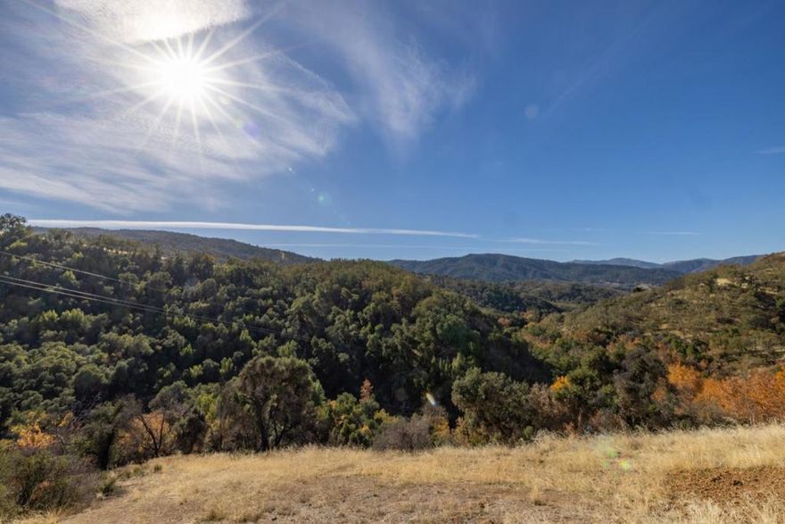 This beautiful land has 360 degree views of the surrounding mountains.  The land offers a very private setting with easy access off Cachagua Road.  Just 20 minutes from the Carmel Valley Village is your opportunity to build your dream home and live the quiet country life in upper Carmel Valley.  The property includes a 30 foot Winnebago RV with air conditioning which is in excellent condition.  Also included are two 20 foot containers for plenty of storage.  A very good producing private well, power at the site and an existing septic system in place makes this lot perfect for building your vacation or full time forever home. The lot has a very flat area for the house and the sloping hill on one side offers privacy from any neighbors.   Once you reach the lot you will be amazed at the privacy and beauty.   You are only 50 minutes from Carmel-by-the-Sea and the Monterey Peninsula Airport, but you will feel like you are miles from anywhere enjoying great weather, peace and quiet and star filled skies at night.    This land is within the highly rated Carmel Unified School District.