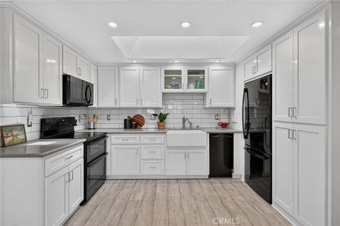 Photo of 1543 Merion Way #M2-45L, Seal Beach, CA 90740 (MLS # PW26212429)