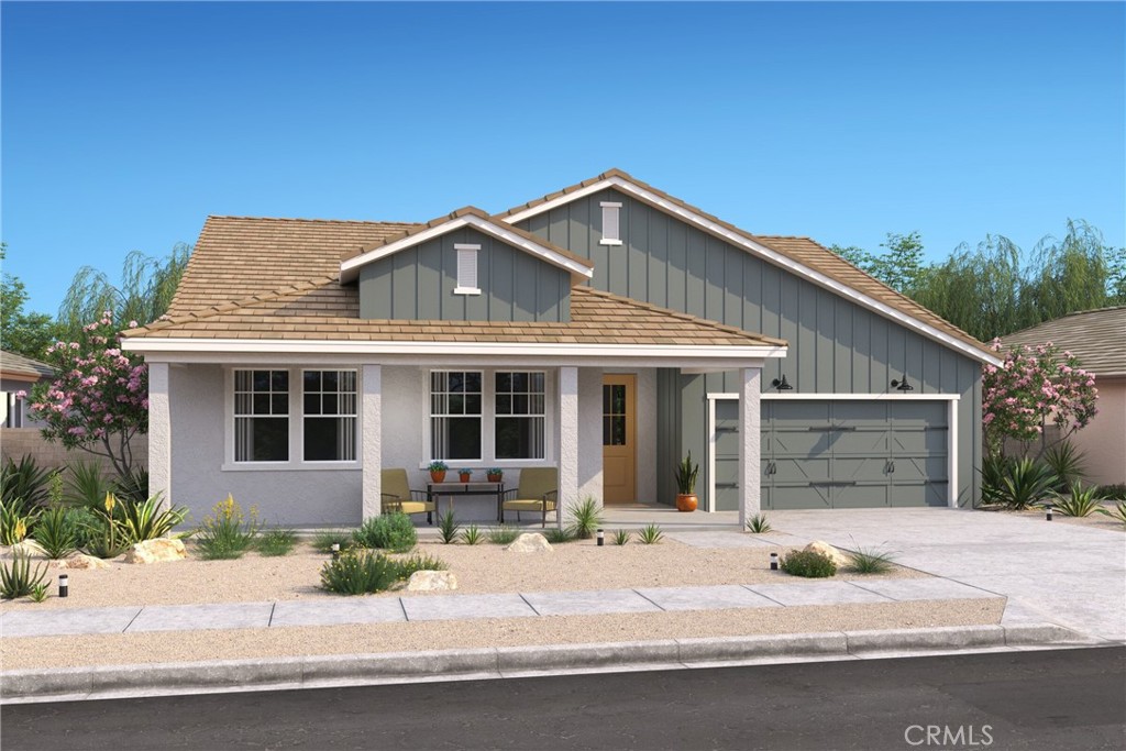 Welcome to the Belfast Plan at Palo Verde by K. Hovnanian Homes, where modern design and functionality come together in perfect harmony. This exceptional single-story home offers 4 spacious bedrooms and 3 full bathrooms, including a versatile Extra Suite that's perfect for multigenerational living or hosting guests in comfort and privacy. This home is a true showpiece, with the rustic charm of our carefully curated Farmhouse-inspired ‘Looks’ interior selections. Upon entering, you'll be captivated by the expansive great room featuring a dramatic cathedral ceiling, creating an open and inviting space ideal for both relaxation and entertaining. The kitchen is a true centerpiece with soft-close White cabinets accented with flat black hardware, Artic White quartz counters, a sleek tile backsplash, an expansive island and upgraded stainless steel appliances. The Extra Suite is a standout feature, offering a private retreat with its own living room and separate entrance, providing both independence and comfort for your guests or extended family. The primary suite is your personal sanctuary, with a spa-like bath that includes dual sinks, a freestanding soaking tub, and an oversized shower, creating the perfect environment for relaxation and unwinding. Thoughtful upgrades throughout the home include quartz countertops in the bathrooms, luxury vinyl plank flooring in the main living areas, plush carpeting in the bedrooms, and elegant tile in the bathrooms. Every detail has been designed to offer the perfect combination of comfort, style, and sophistication. Don’t miss your opportunity to make this dream home yours! ***Price subject to change.