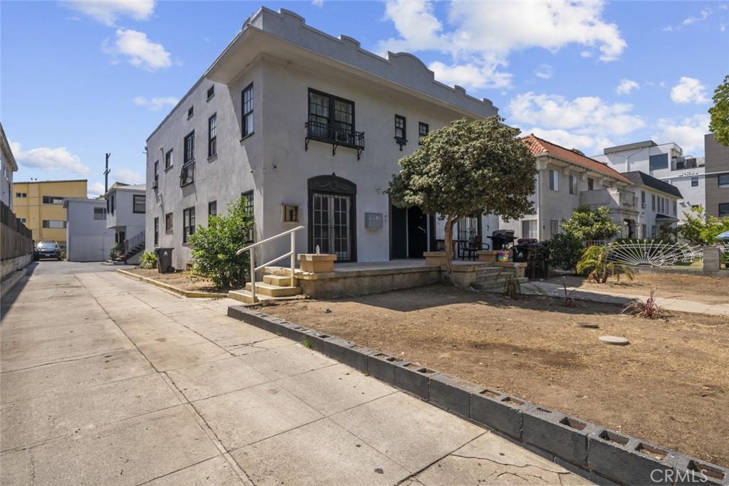 Developers! Prime Opportunity Zone investment located on a 10,324 Sq Ft LAR3-zoned lot in the highly desirable Mid-Wilshire area. This property features three separate buildings and is situated within a TOC Tier 3 zone, offering excellent potential for increased density and attractive tax incentives. Each unit includes its own washer/dryer hookups and is separately metered, providing convenience for tenants and operational efficiency for ownership. The buildings have been well maintained and offer significant rental upside in a rapidly developing neighborhood, just minutes from Los Angeles City College. Do not disturb occupants. Interior inspections to be scheduled upon accepted offer.