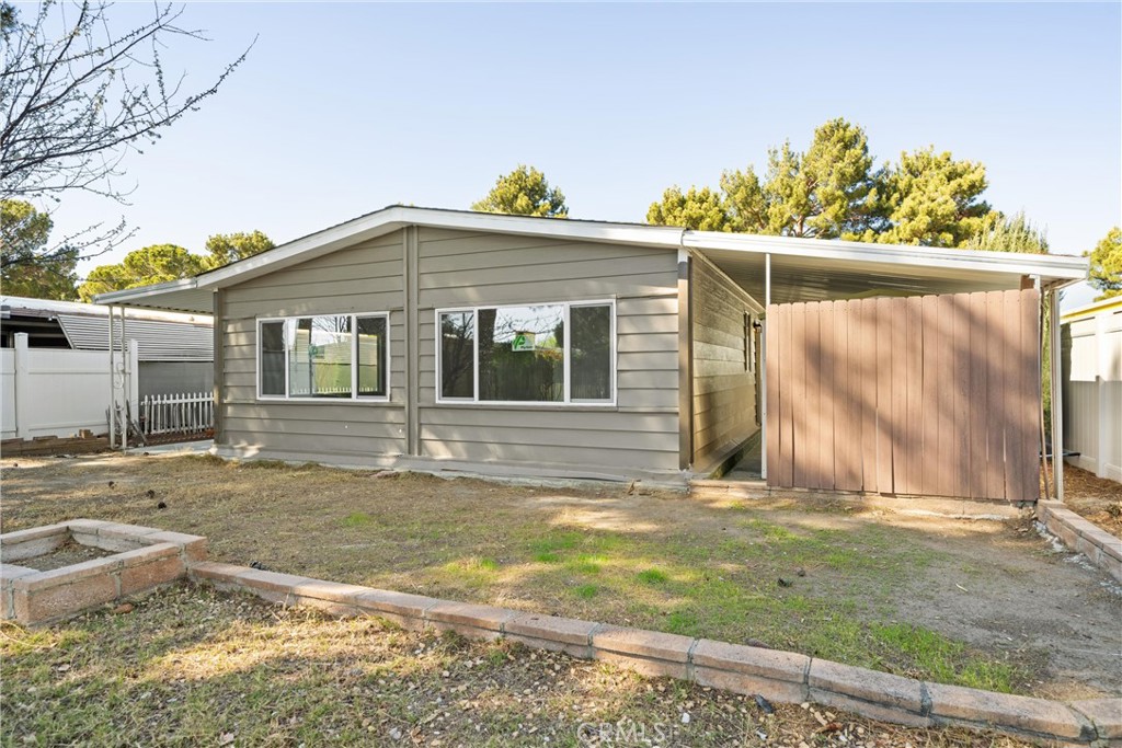 Welcome Home! Step into your completely upgraded home at the most desirable mobile home park; Leisure Lake Mobile Home Park. The 2 bedroom and 2 bath is move in ready for you. The brand new flooring all throughout the home compliments the fresh new paint. Find yourself in this cozy kitchen with brand new stainless steel appliances. The brand new Air Conditioning Unit will be a delight and ready for summer. You have washer/dryer hookups with a nice floor plan. The mobile home also has 2 new windows and the roof is 4-5 years old. The shed outside can be used for your decorations or extra storage. Come by and take a look today. Don't miss the opportunity to live with all the amenities you need.