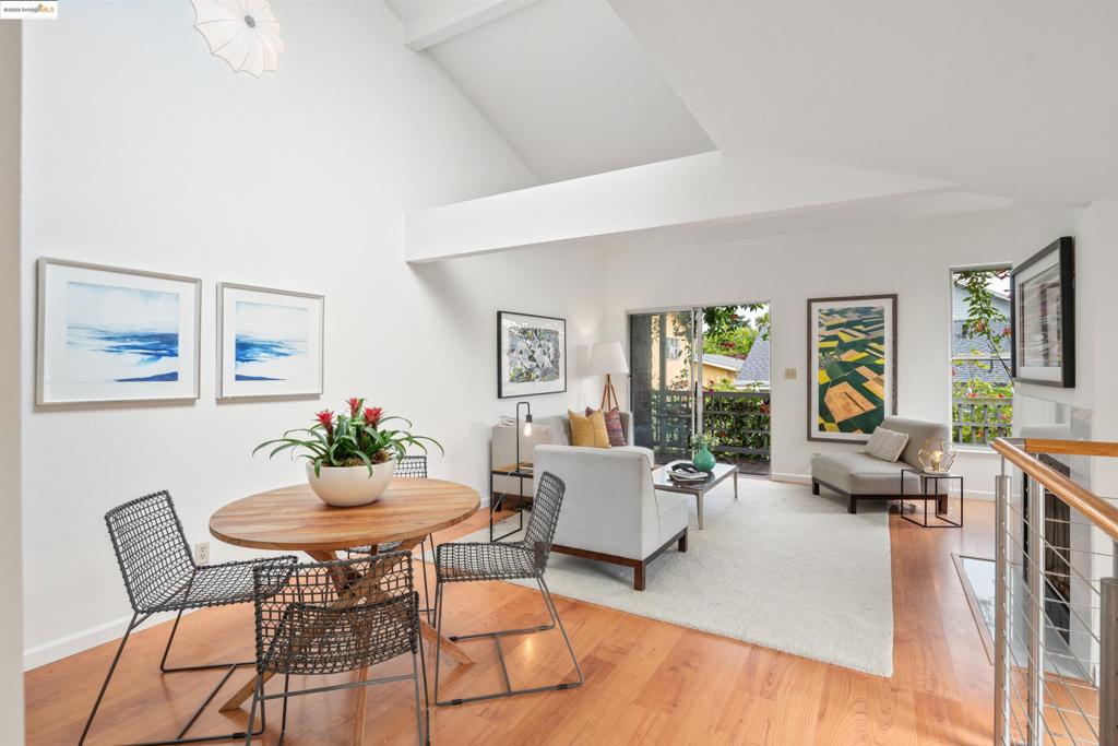 Tucked away from the street in a tranquil setting, 1812 Dwight Way Unit #1/2 is a thoughtfully designed townhome situated in one of Berkeley's most convenient neighborhoods. This modern two-level home is filled with natural light, with a living room that features vaulted ceilings, a cozy fireplace, and large windows that draw the outside in. The updated kitchen includes marble countertops and flows easily into the living area and out to a generously sized balcony lined with a lush trumpet vine—an inviting spot to unwind or entertain among the greenery. The sunny, private, south-facing backyard, in addition to another smaller yard at the north side, offers even more outdoor space for gardening or relaxing in the open air. A full bathroom on the ground floor and a half bath upstairs add to the home's flexible layout. Additional amenities include an in-unit washer and dryer, a central furnace, and two deeded parking spaces near the unit—perfect for convenient access or potential EV charging*. Located just blocks from Ashby BART, San Pablo Park, and local favorites like Berkeley Bowl, Kirala, and Tanzie’s, this home combines comfort, functionality, and an unbeatable central location.