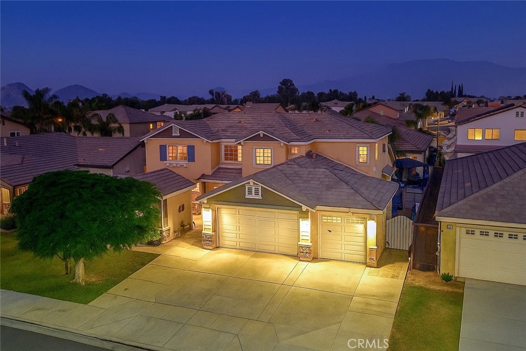 Welcome to your dream home nestled in the heart of San Jacinto! This stunning 6-bedroom, 5-bathroom residence offers the perfect blend of space, comfort, and versatility—ideal for multi-generational living, a growing family. Step inside to discover an open-concept floor plan featuring high ceilings, generous natural light, and seamless flow between the living, dining, and kitchen areas. The gourmet kitchen boasts granite countertops, ample cabinetry, a center island, and stainless-steel appliances—perfect for both everyday living and entertaining. The main home offers 5 spacious bedrooms and 4 full baths, including a luxurious primary suite with a walk-in closet and spa-like ensuite. Upstairs and downstairs bedrooms provide flexibility and privacy for all family members.
But the real gem? A separate front-entry studio complete with its own private bathroom—ideal for guests, extended family, or potential rental income. Whether you’re hosting visitors or generating extra cash flow, this space adds incredible value.
Enjoy summer evenings in the private backyard, featuring room to entertain, garden, or simply relax.