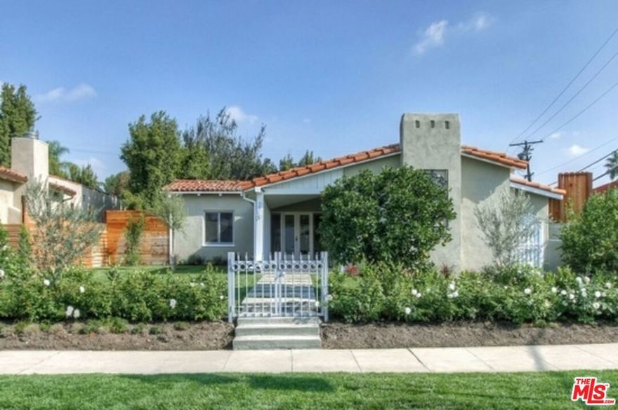 Home in Highly Sought-After Beverly Grove. This stunning residence offers generous living space and a prime location in the heart of Beverly Grove. Step into a newly updated, oversized kitchen complete with a sleek center island perfect for cooking and entertaining. The home features three spacious, modern bathrooms and a bright, inviting dining room ideal for family gatherings. Soaring ceilings and a cozy fireplace enhance the elegance of the living room. Enjoy the California lifestyle in the beautifully landscaped backyard, featuring an outdoor kitchen, built-in BBQ, and a sparkling pool perfect for cooling off on warm days. This home truly has it all: comfort, style, and a location that can't be beat.
