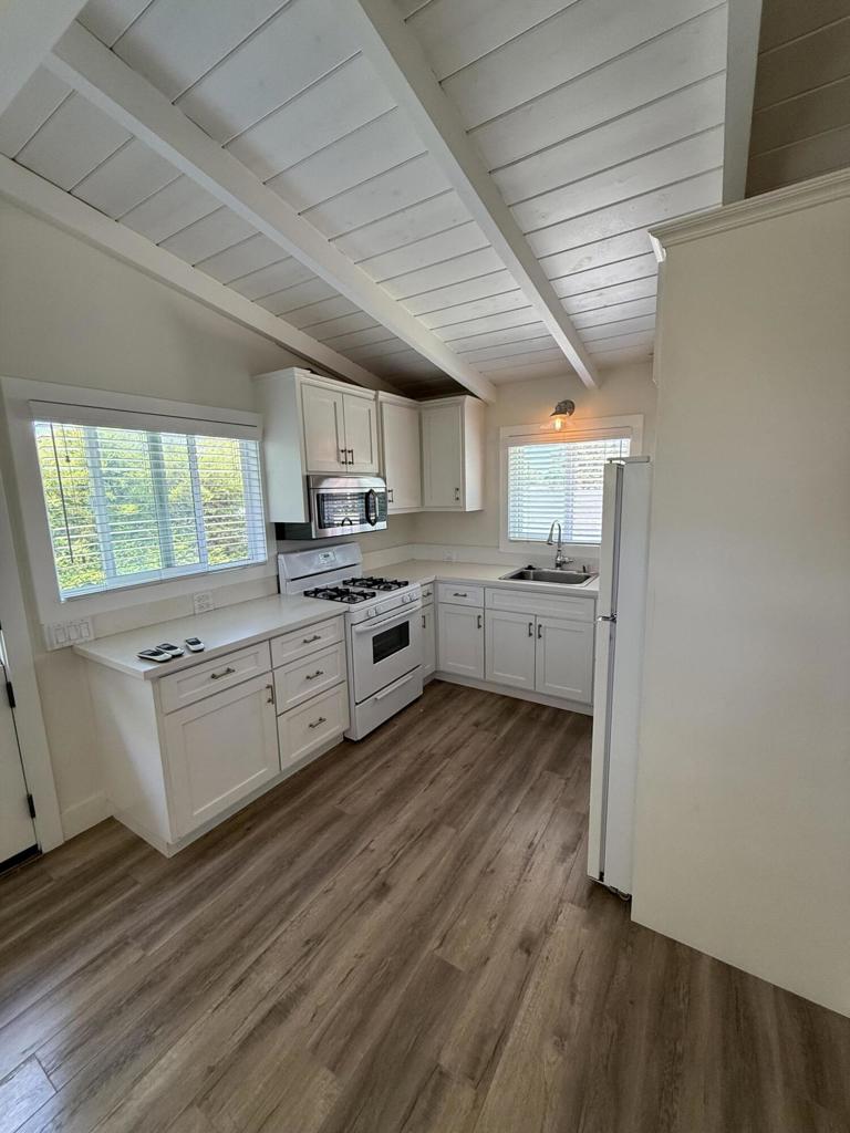 Wow! Location. Location. Location. This beautiful detached upper back unit located in Newport Heights has your name all over it! This unit features 2 bedrooms and 1 bathroom, and a remodeled kitchen. This upper unit has a private laundry area. High ceilings and amazing natural light. Dual pane windows, laminate flooring throughout. This unit is walking distance/bike ride distance to the Balboa Peninsula beaches. Also the unit is in very close proximity to all the best restaurants and retail shops on 17th street has to offer. Please call today to schedule your own tour today. Short notice is welcome is OK.