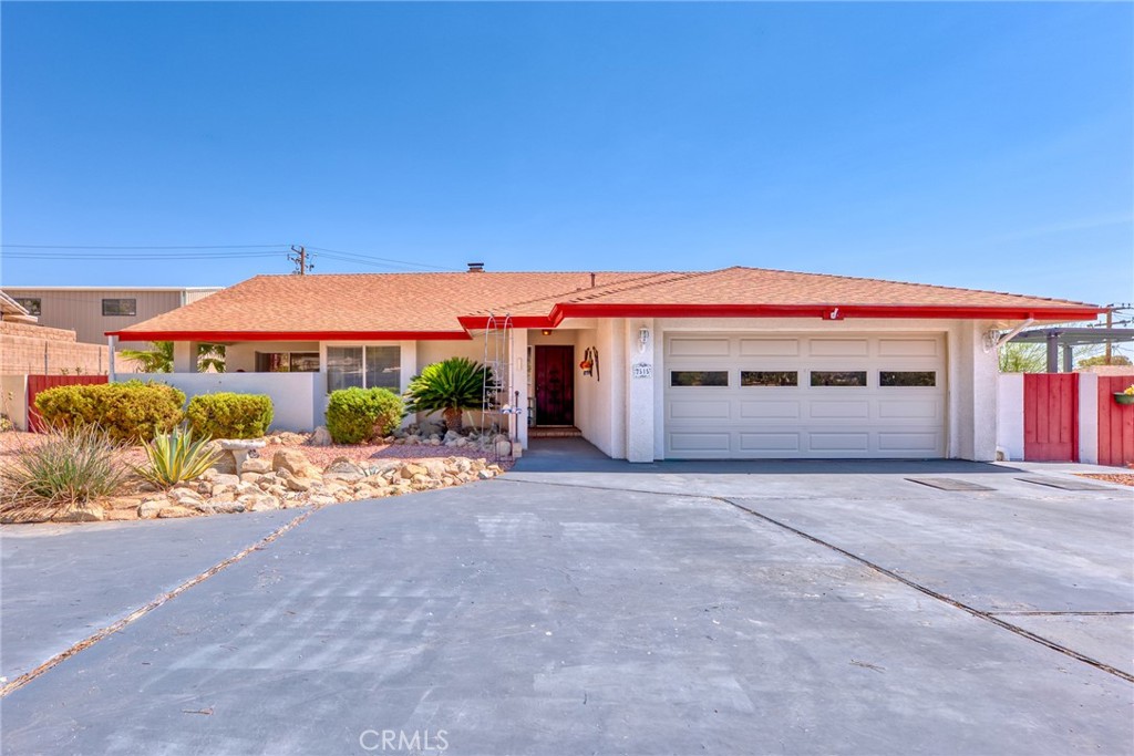 Come check out this beautifully maintained 3-bedroom, 2-bathroom home located in the highly sought-after Country Club neighborhood, just minutes from the golf course. The front and back yards are meticulously landscaped, offering multiple sitting areas where you can relax and enjoy both the sunrise and sunset. A private gazebo surrounds the hot tub, providing the perfect space to unwind after a long day. The circular driveway offers convenient access and ample parking. Inside, you’ll find a cozy atmosphere with a formal living and dining area that opens to a patio—ideal for outdoor entertaining. There’s also a tucked-away wet bar for added convenience while hosting. The family room features a charming fireplace, perfect for cool winter nights. The home includes both a MasterCool evaporative cooler and a central HVAC unit for year-round comfort. The kitchen comes fully equipped with appliances and offers plenty of cabinet space, just like the rest of the home, which features lots of cabinet and storage space throughout to meet all your organizational needs. The front bathroom features a skylight, while the spacious primary suite offers dual vanities, a walk-in shower, and his-and-hers walk-in closets. The backyard includes a fully enclosed patio with ceiling fans, providing a comfortable space to entertain or relax no matter the season. An indoor laundry area with dryer and a pocket door adds functionality, and the finished garage includes a quiet automatic door opener. Don’t miss this incredible opportunity to own a home in the desirable Country Club area, just a short drive from the green!