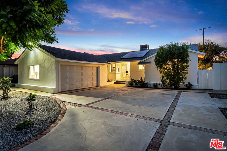 Welcome to Prime West Hills! This reimagined 4BR + 2BA, approximately 1,950 sq ft, California Ranch has been thoughtfully transformed into a turnkey gem, blending timeless charm with thoughtful upgrades. Inside, the open-concept design creates effortless flow for both entertaining and everyday living. At the heart of the home, the chef's kitchen showcases a sleek quartz countertop, a large island, and premium stainless-steel appliances, including a 5-burner Samsung oven/stove, a Kitchenaid dishwasher, and a wine cooler. Refinished hardwood floors, recessed lighting, and a cozy fireplace bring warmth and style throughout. Outdoors, a spacious yard with citrus trees sets the stage for gatherings, play, or quiet evenings under the stars. Additional upgrades include TESLA SOLAR, a newer roof, and a tankless water heater, fresh paint inside/out, recessed lighting, smooth ceilings, a refreshed entry, and a beautifully finished garage (recently used as a 4th BR) w/walkin closet that adds versatile living space. Off-property benefits include award-winning schools and convenient access to Shoup Park, The Westfield Mall, The Village, and Warner Center, offering an amazing selection of restaurants, boutiques, shopping, and more. See the website for a comprehensive view of this property via video/aerial/drone/3D imaging.