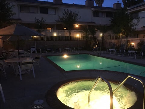 Photo of 19451 Sherman Way Way #506, Reseda, CA 91335 (MLS # SR26194615)