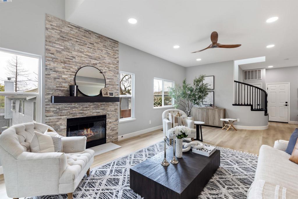 Step into this light, airy, fully updated and remodeled throughout modern home in the heart of Benicia! This stunning 4-bedroom, 2.5-bathroom home boasts 2,177 sq. ft. of beautifully remodeled living space on a 4,791 sq. ft. lot. The open-concept downstairs layout creates a seamless flow between the kitchen, family room, and dining area, perfect for both relaxing and entertaining. The fully updated interior features fresh interior and exterior paint, stylish LVP flooring throughout. Sleek eat-in kitchen w/professional series stainless steel appliances, slab counters, stone backsplash, that overlooks the family room. Beautifully updated fireplace adds warmth & charm to the main living space w/skylight, windows & door to backyard. Upstairs, the spacious primary suite is a true retreat, featuring a gorgeous separate soaking tub, walk-in shower, two closets, & a private balcony overlooking the quiet cul-de-sac. Laundry room is conveniently located upstairs for easy access. Step outside onto the deck off the family room to enjoy fresh air, admire the view, & take in the newly landscaped backyard. The home also includes a 2-car garage, offering ample storage and parking. This home perfectly blends modern elegance with everyday convenience, don’t miss your chance to make it yours!