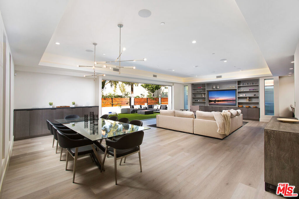 Available fully furnished and turn key. This furnished 5 bedroom en-suite, 4.5 bathroom 4,000 square foot modern property offers a light, bright and open floor plan with high ceilings. Flooded with natural light and open-concept spaces that define California living. The custom kitchen is complete with an expensive island including bar seating, soft-close cabinets and high-end appliances. Kitchen is a Kosher kitchen. From the gorgeous open living areas, walls of glass open to spectacular outdoor entertaining spaces, such as a private jacuzzi and stunning 360 degree rooftop deck. In addition, there is an easy access elevator which takes you from the first floor to the rooftop deck. Perfect location within minutes from shopping, beaches, museums, UCLA. *1ST MONTH FREE PROMO - PRICE REFLECTS 12M SPREAD - BASE RENT 10,900*