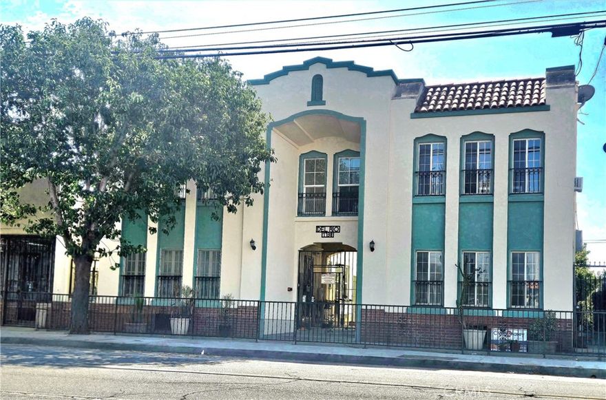 A Long Beach Gem! FULLY remodeled beautiful 1924 Mediterranean unit, where timeless charm meets modern day luxury and state of the art features, all in one of Long Beach's most vibrant neighborhoods! Nearly 600 sqft of exquisitely renovated living space. Comfortable open floor plan w/spacious living/dining area w/high ceilings bathed in natural light from the large windows; treetop view gives a fresh feel, added shade & privacy, new ceiling fan, new mini split HVAC, for ambiance & added heat source, a cozy faux fireplace ready to relax, wind-down and sip some tea, read a book or enjoy a glass of wine! There is an outlet set up ready to install a TV and a large walk-in closet for storage! Stunning modern completely remodeled bright kitchen is a chef's delight! NEW state of the art energy efficient stainless-steel appliances includes an induction range with a pot filler faucet above, refrigerator w/ice maker, dishwasher, microwave. New sleek quartz countertops, high-quality cabinets w/self-closing drawers & ample storage with under cabinet lighting, deep stainless-steel sink w/accessories, dimming recessed lighting & light fixture compliment the entire kitchen. Spacious bedroom can accommodate a queen size bed, large windows, ceiling fan offering a choice of natural lighting modes, mini split HVAC system & large walk-in closet. Beautiful remodeled ALL NEW Bathroom w/ porcelain tile & accent features, quality cast iron bath with shower, solid vanity w/quartz counter, stylish Roman arch vanity mirror with built in outlet for charging inside, New skylight! Wait, and that's not all! This home is also equipped with a new washer/dryer combo that is neatly hidden away in a laundry closet that comes with space for laundry basket /storage! This home features NEW high-quality vinyl flooring (with warranty) and 9-foot ceilings that add to the open and airy feel, new doors, NEW copper plumbing, upgraded electrical, electric pane & outlets meeting today's high-tech lifestyle, and a surge protector for the whole entire unit! (see supplements for complete list of features). THIS HOME COMES WITH TWO ASSIGNED PARKING SPACES IN A PRIVATE PARKING LOT & NEW TESLA 60 AMP EV CHARGER (to be installed). This home is fully loaded! Adjacent to the trendy Retro Row, Walking or bike to beach, parks, shopping, dining, bars, entertainment, museums, theaters, 2nd street, Downtown Long Beach, LB Convention Center, public Transporation, Metro, close to freeways!