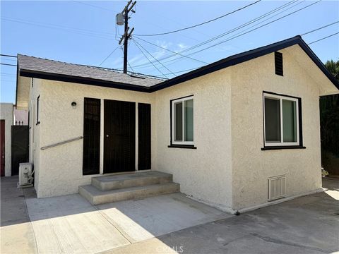 Photo of 1426 W 83rd St, Los Angeles, CA 90047 (MLS # DW26084587)