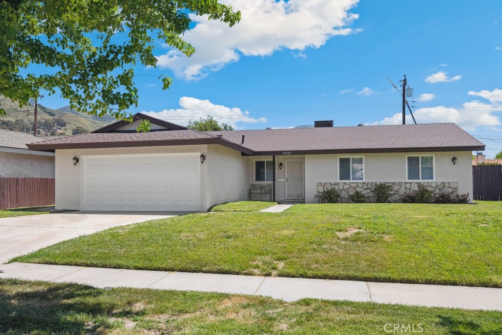 Move-In-Ready single story home located in an established San Bernardino neighborhood with great curb appeal and gorgeous mountain views! This 4 bedroom, 2 bathroom home features a ~~NEW ROOF~~ NEW INTERIOR/EXTERIOR PAINT~~ VINYL PLANK FLOORS~~ a REMODELED KITCHEN~~ TEXTURED CEILINGS~~ REMODELED BATHROOMS~~ CUSTOM BASEBOARDS~~ DOUBLE PANE WINDOWS~~ and a NEW GARAGE DOOR OPENER on the attached 2-Car Garage which offers direct interior access. As you enter the home you are greeted with the Dining Room and the beautifully remodeled Kitchen with white cabinets, quartz countertops, and a stainless steel oven. The Living Room is large and has a sliding glass door to the private backyard. All of the Bedrooms are generously sized with the Primary Bedroom sitting at the end of the hall and featuring plenty of space for large pieces of furniture. The Primary Bathroom has a quartz counter and spa-like walk-in shower with tile and accessible grab bars. The 3 Secondary Bedrooms all share a remodeled Hall Bathroom! Enjoy the private, flat, backyard with grass lawn and beautiful mountain views, providing for a great place to host guests or relax. With NO HOA and a LOW TAX RATE, also down the street from Harrison Canyon Park and centrally located near schools, shopping, and dining! This home is truly a MUST SEE! Schedule your private tour today!