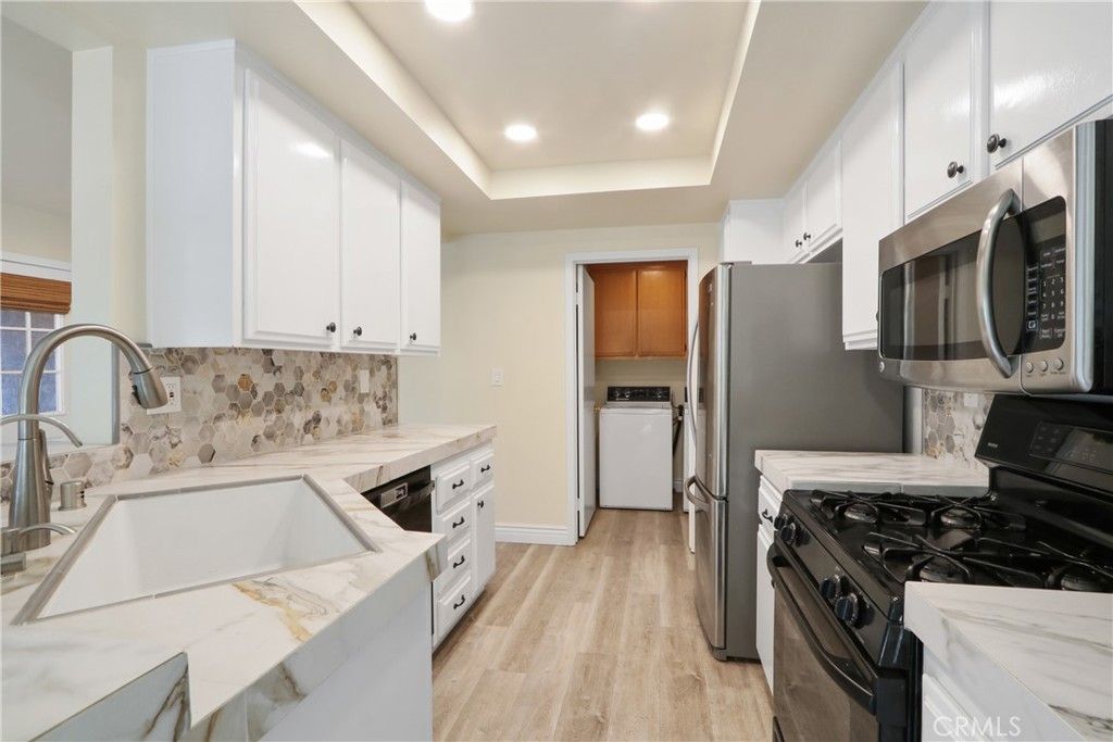 Photo of 27412 Iris Ave Ave, Mission Viejo, CA 92692 (MLS # OC25275049)