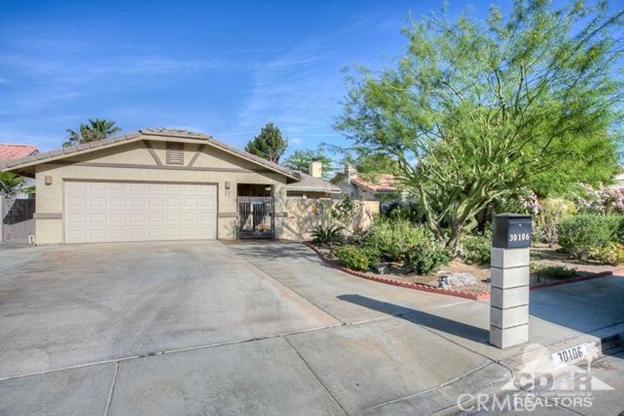 Welcome home! This home oozes curb appeal from the minute you drive up the driveway to the very private, enclosed courtyard which has an electronic retractable awning. The interior of the home is fully tiled, except the bedrooms which have real cherry wood flooring. The kitchen has been recently redone with newer granite counter tops and the cabinets resurfaced. There is newer lighting fixtures throughout as well as newer restroom and kitchen faucets. The backyard is very serene with a custom aluma-wood patio and surrounded with citrus trees. Additional custom storage space was added to the side of the home for the gardener enthusiast. This home will not last as there is none on the market that compares.
